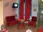 Living room in hostal in Cuba